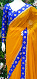 SAFFRON AND CLASSIC BLUE CONTRAST PARTY WEAR SAREE - Asian Party Wear